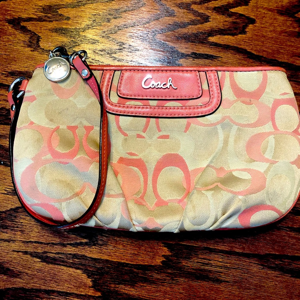 Pink and tan CC Coach wristlet 💞